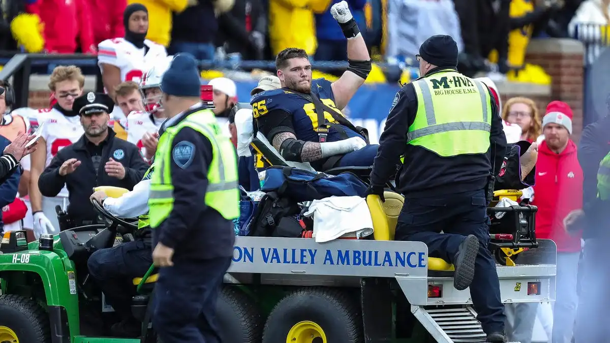 Fútbol americano de Michigan, Zak Zinter, lesión, rally, espiritual